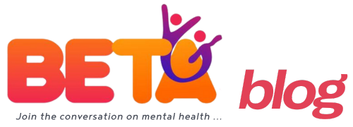 BETABlog logo featuring a the BETAlife original logo in shades of orange and purple with the text "BETABlog" below it. Join the conversation on mental health.